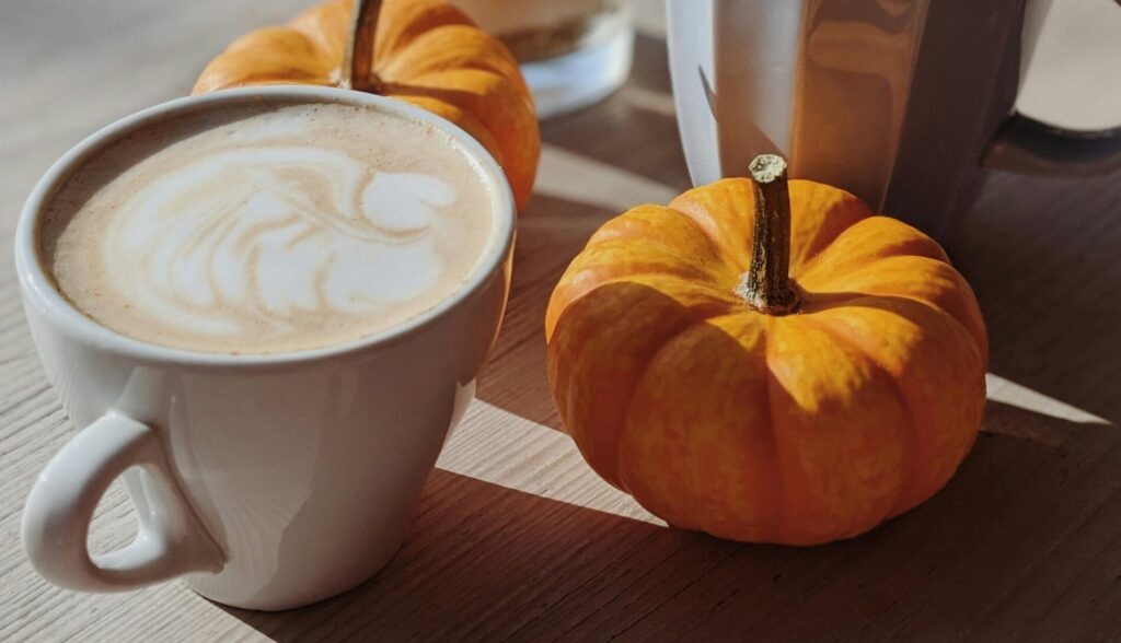 coffee in a cup with pumpkins