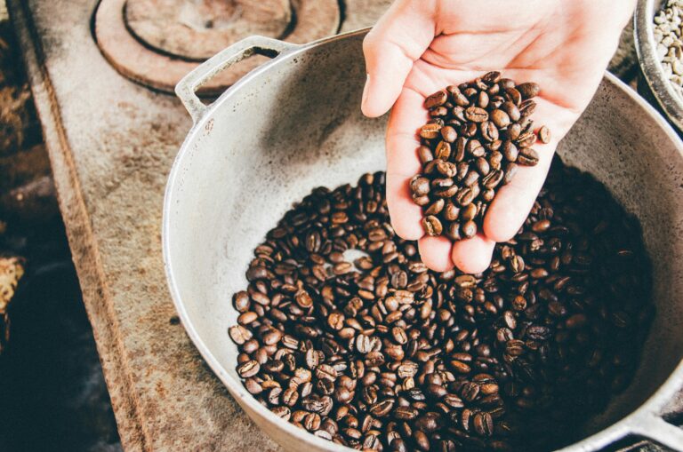 Why Coffee Grind Size Matters coffee beans on hand