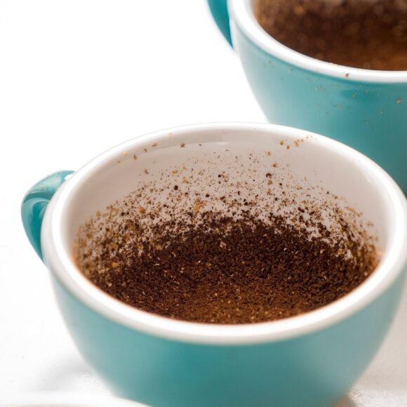 blue cups in line for coffee cupping